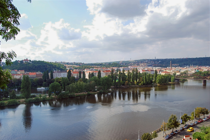 13 - A scenic view of the Vltava River and urban landscape in Prague, Czech Republic, viewed from the elevated walls of Vyšehrad